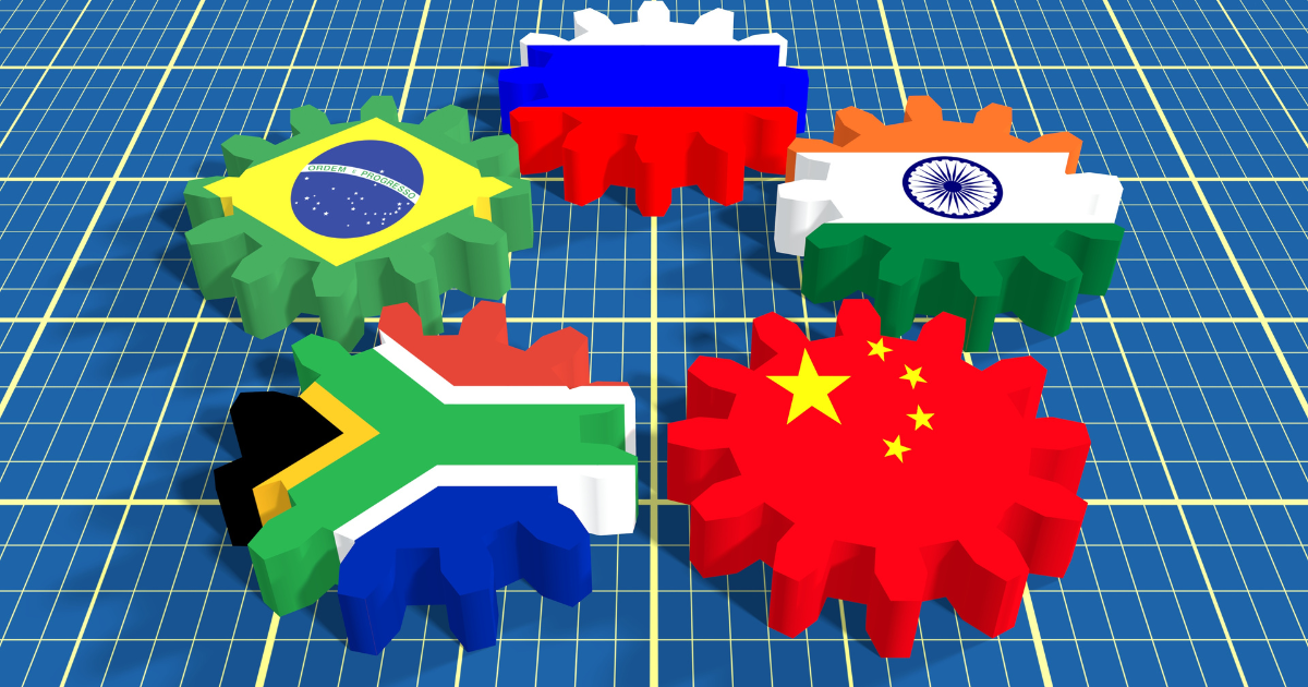 BRICS - association of five major emerging national economies members flags on cog wheels. Blueprint surface. Trade union.